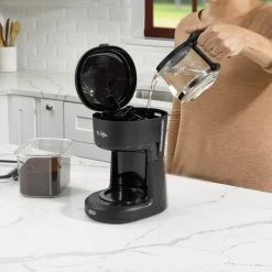 Mr. Coffee® 5-Cup Coffee Maker, 25 oz. Mini Brew 19 Mr. Coffee® 5-Cup Coffee Maker, 25 oz. Mini Brew -Home Food Life Store pouring
